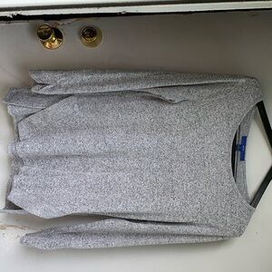 A long sleeve gray shirt